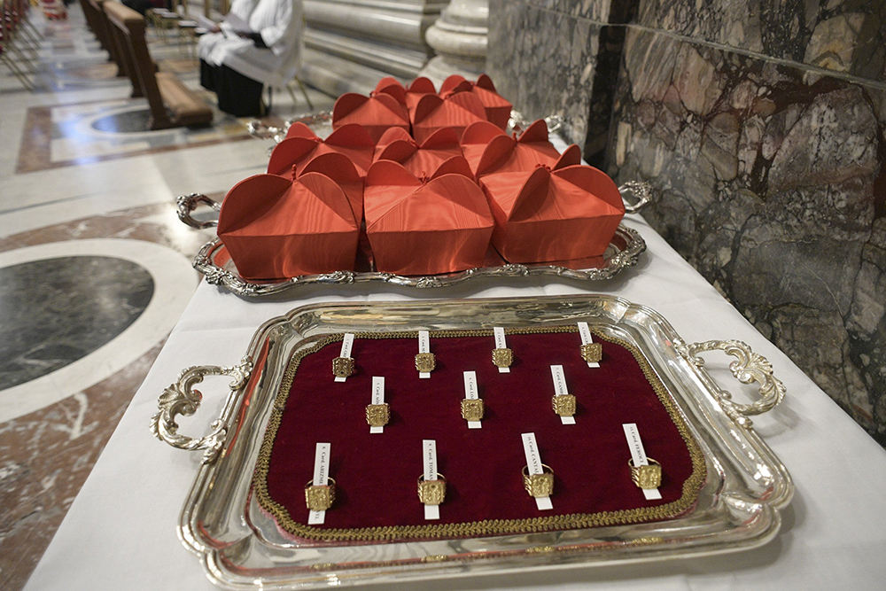 Red birettas and rings are pictured at a consistory led by Pope Francis for the creation of 13 new cardinals in St. Peter's Basilica at the Vatican in this Nov. 28, 2020, file photo. (OSV News/Vatican Media)
