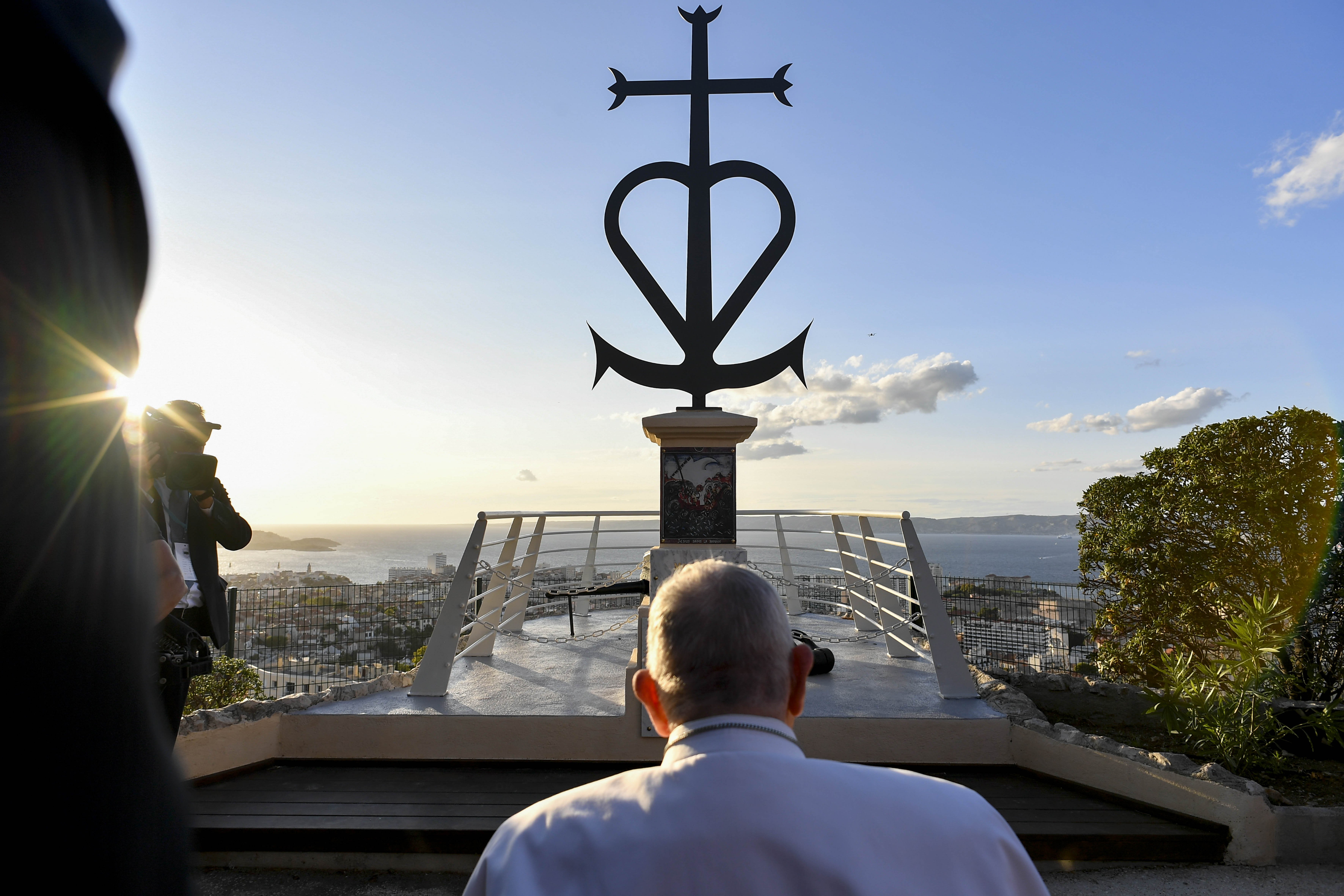 Pope Francis pauses before a memorial dedicated to sailors and migrants lost in the Mediterranean Sea in Marseille, France, Sept. 22, 2023. (CNS photo/Vatican Media)