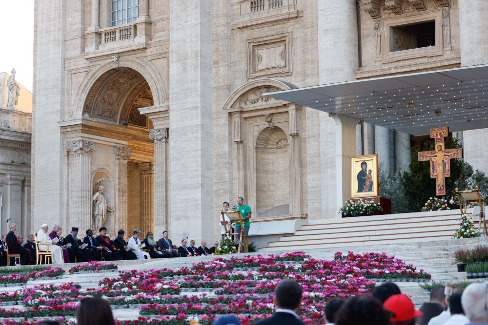 Young people lead the prayers as Pope Francis and the leaders of other Christian communities gather for an ecumenical prayer vigil in St. Peter's Square Sept. 30,  ahead of the assembly of the Synod of Bishops. The synod opens Oct. 4. (CNS photo/Lola Gomez)