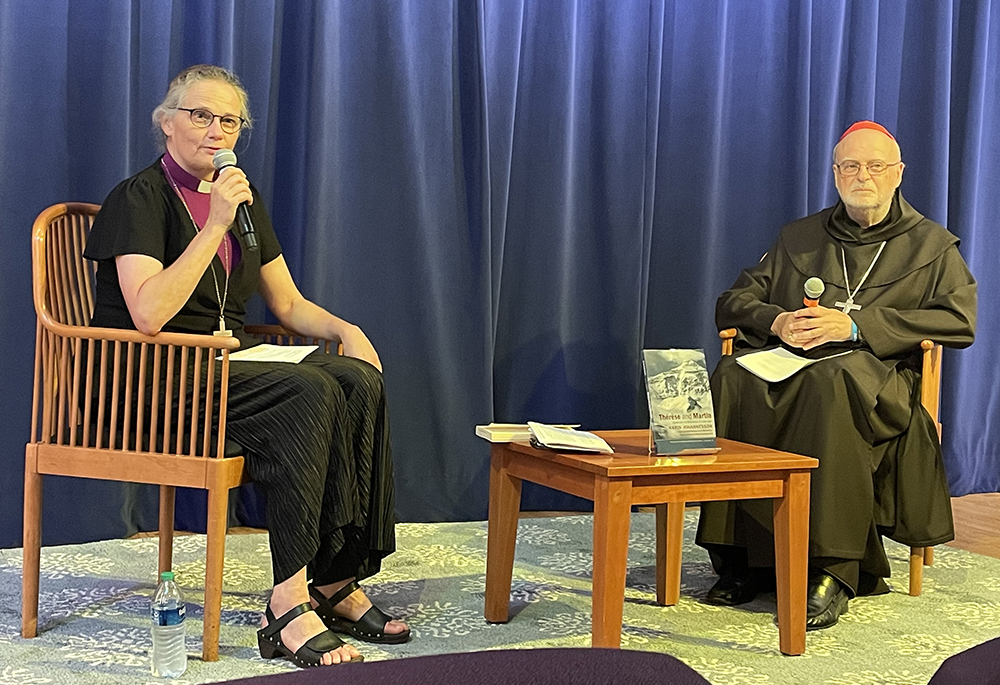 Bishop Karin Johannesson, an assistant bishop in the Lutheran Archdiocese of Uppsala, speaks during an Aug. 27 event in Washington at the St. John Paul II National Shrine, as Cardinal Anders Arborelius looks on. (Courtesy of the Catholic Church in Sweden/ Catholic Diocese of Stockholm)