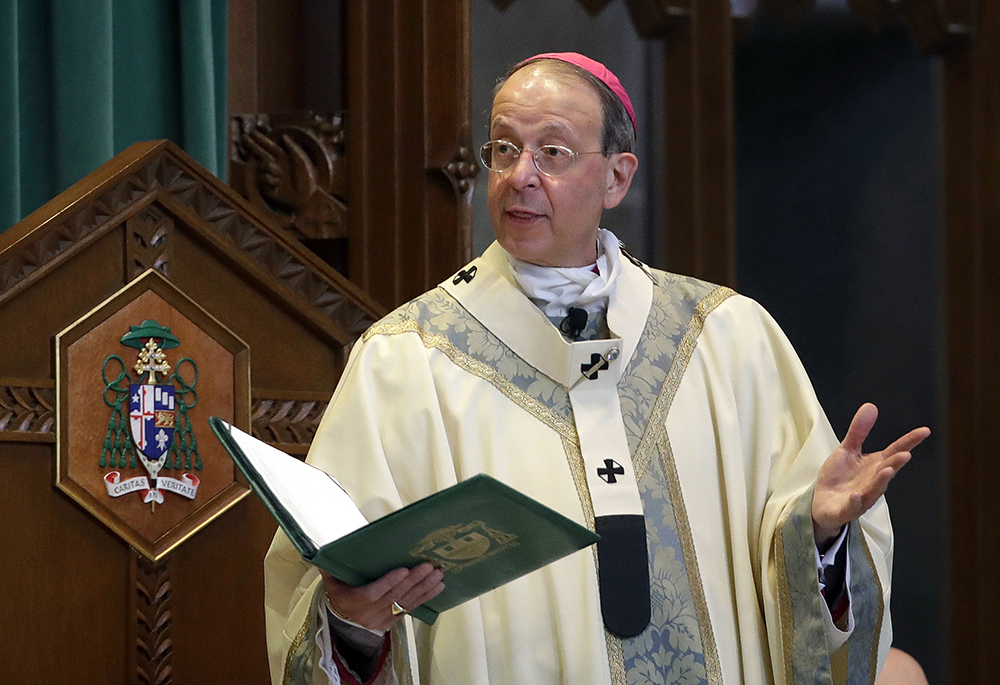 Baltimore Archbishop William Lori leads a funeral Mass March 28, 2017, in Baltimore. The Baltimore Archdiocese filed for Chapter 11 reorganization Sept. 29, days before a new state law goes into effect removing the statute of limitations on child sex abuse claims and allowing victims to sue their abusers decades after the fact. (AP photo/Patrick Semansky, File)