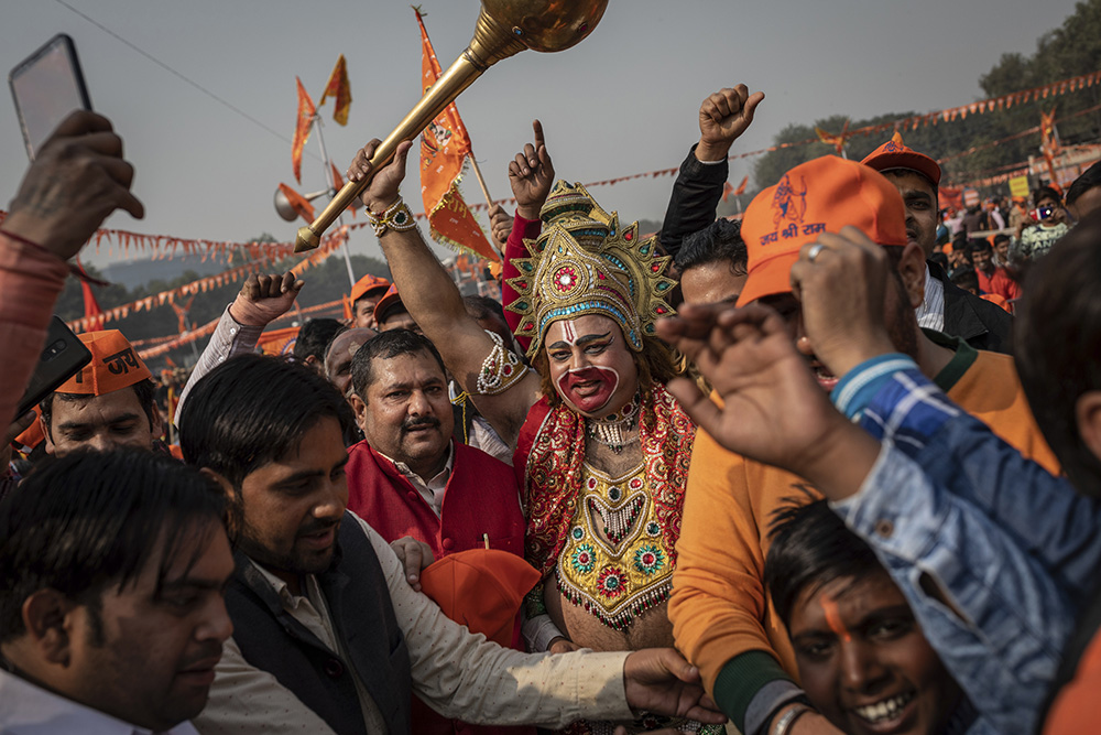 A supporter of the Hindu nationalist political group Vishwa Hindu Parishad is dressed as the Hindu deity Hanuman during a rally in New Delhi on Dec. 9, 2018. (AP/Bernat Armangue)