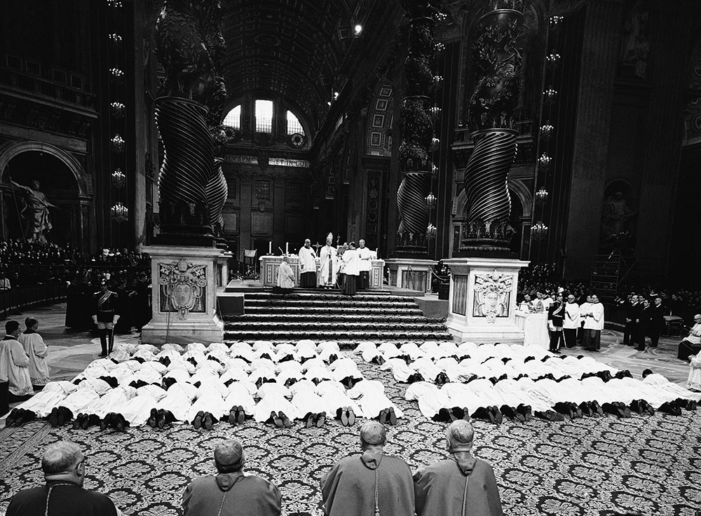 Pope Paul VI ordains 62 seminarians from 23 countries in St. Peter's Basilica, Vatican City, Jan. 6, 1966. It was the first conferring of holy orders by a pope in modern times. (AP/Mario Torrisi)