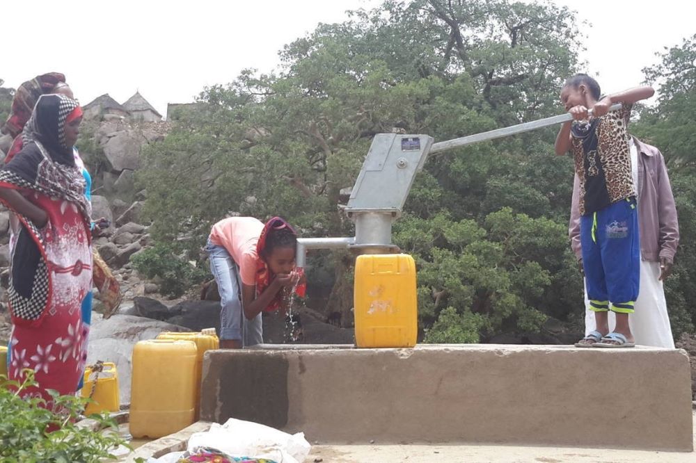 People pumping water in Ethopia