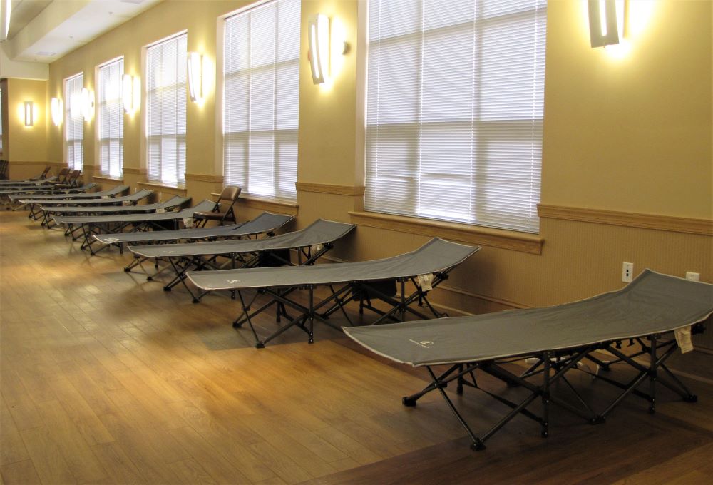 A row of empty cots