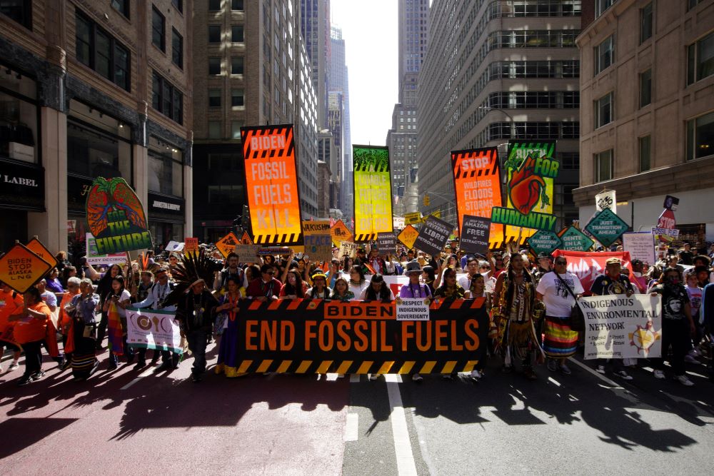 Activists mark the start of Climate Week in New York City Sept. 17, during a demonstration calling for the U.S. government to take action toward ending fossil fuel use in order to reduce the impact of global climate change. (OSV News/Reuters/Eduardo Munoz)