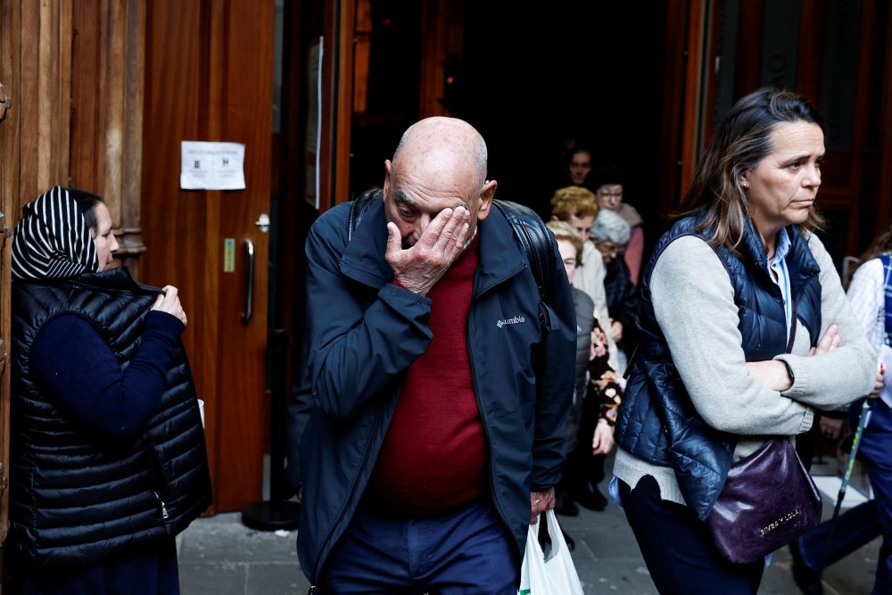 A man reacts while leaving a Mass at Santiago Cathedral in Bilbao, Spain, March 24, that was celebrated to recognize and apologize to victims of sexual abuse within the Catholic Church. (OSV News/Reuters/Vincent West)