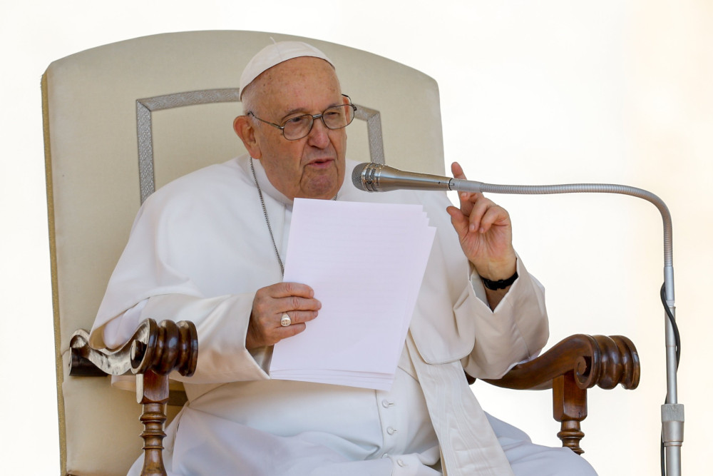Pope Francis speaks during his weekly general audience May 24, 2023, in St. Peter's Square at the Vatican. (CNS photo/Lola Gomez)