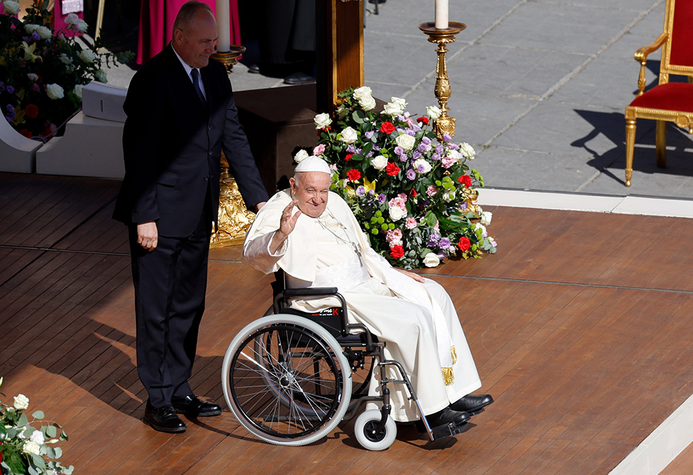 Pope Francis waves to the crowd at the end of a consistory for the creation of 21 new cardinals in St. Peter's Square at the Vatican Sept. 30. (CNS/Lola Gomez)