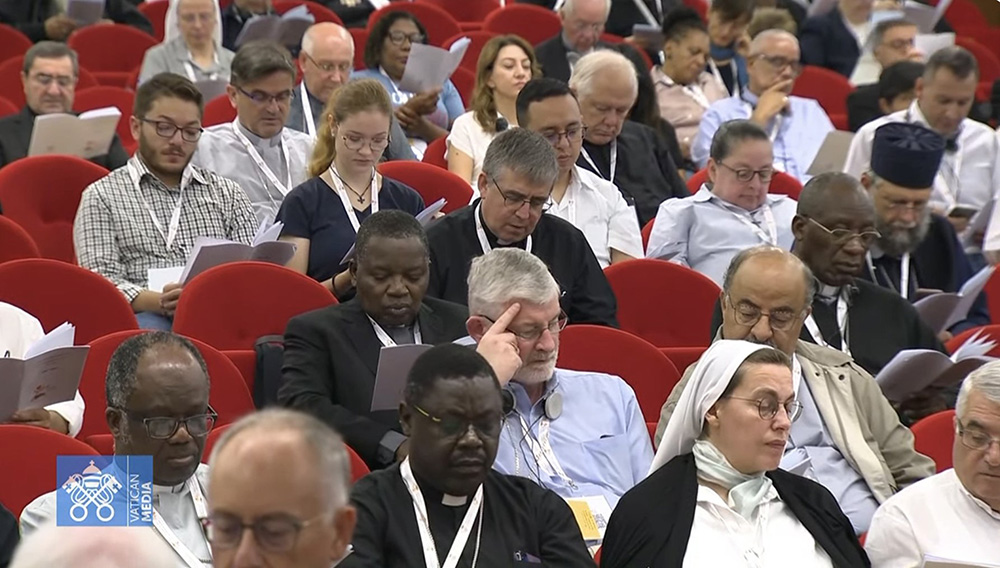 Members of the assembly of the Synod of Bishops recite morning prayer during their retreat outside of Rome in this screen grab from Oct. 3. (CNS/YouTube/Vatican Media)