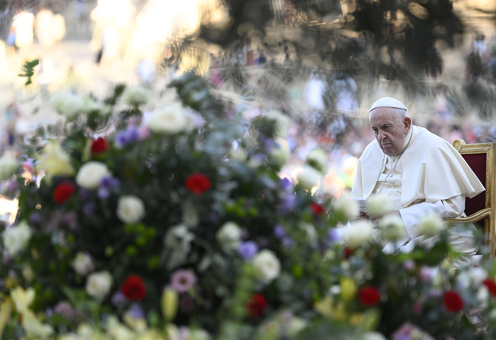 Pope Francis listens during an ecumenical prayer vigil before the assembly of the Synod of Bishops in St. Peter's Square, Sept. 30 at the Vatican. (CNS/Vatican Media)