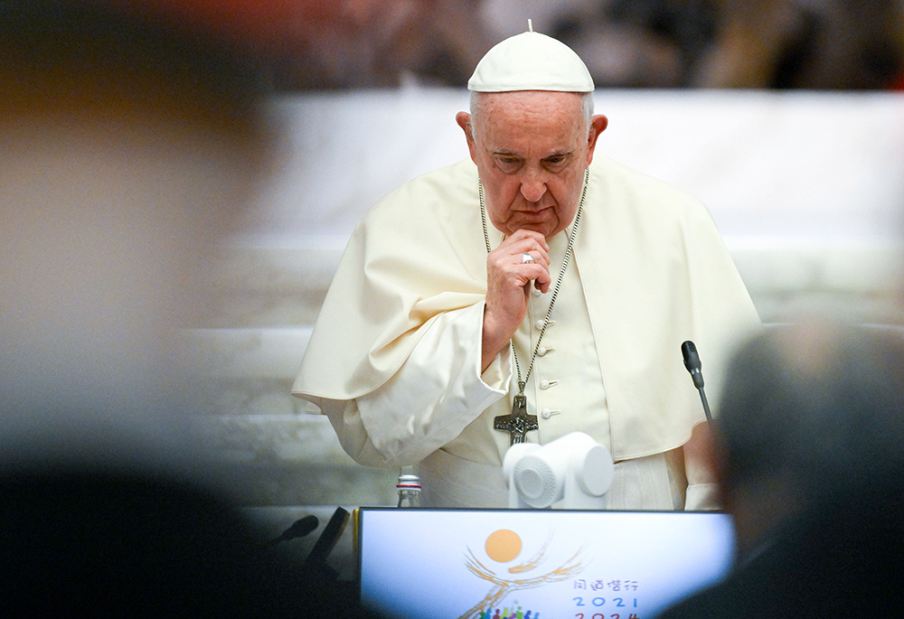 Pope Francis listens during the opening session of the assembly of the Synod of Bishops in the Paul VI Audience Hall at the Vatican Oct. 4. (CNS/Vatican Media)