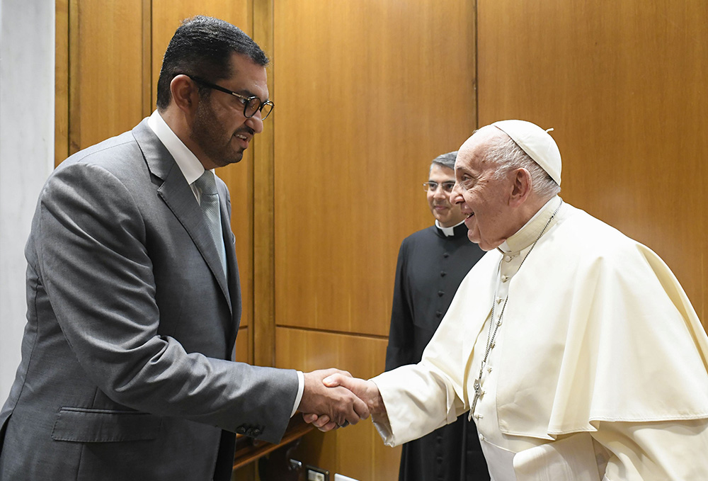 Pope Francis welcomes Sultan al-Jaber, the president-designate of the 2023 United Nations Climate Change Conference, known as COP28, to the Vatican Oct. 11. COP28 is set to open Nov. 30 in Dubai, United Arab Emirates. (CNS/Vatican Media)