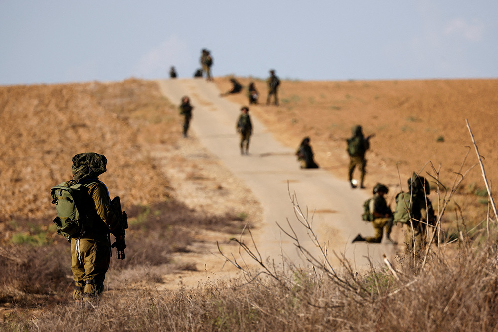 Israeli soldiers patrol an area near Israel's border with the Gaza Strip in southern Israel Oct. 19. (OSV News/Reuters/Amir Cohen)