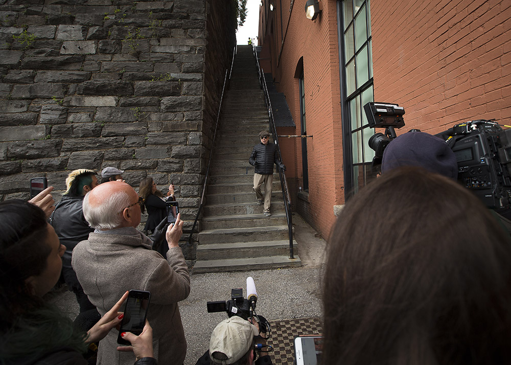 William Friedkin, director of the 1973 film "The Exorcist" walks down the steps on Prospect Street in Washington, D.C., on April 17, 2018, where the character of Father Karras tumbled to his death in the movie. (CNS/Tyler Orsburn)