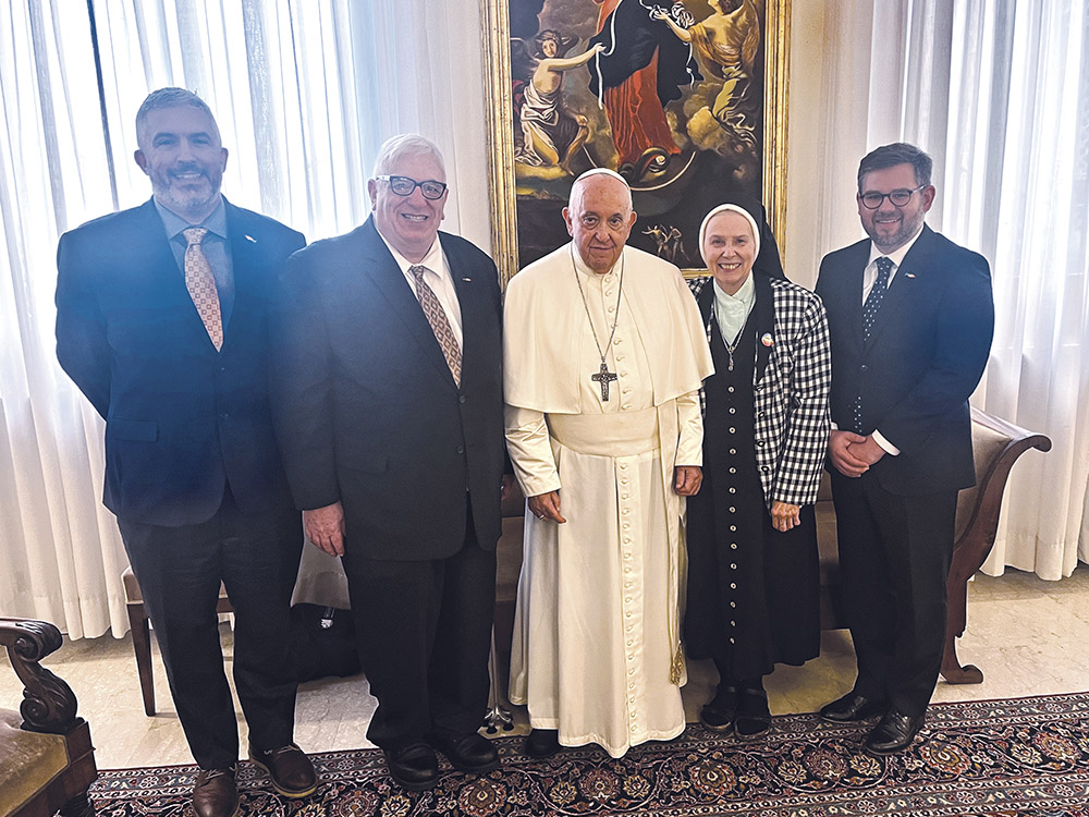 At the Vatican's Casa Santa Marta Oct. 17, from left: Matthew Myers, New Ways Ministry's staff associate; Francis DeBernardo, New Ways Ministry's executive director; Pope Francis; Loretto Sr. Jeannine Gramick, New Ways Ministry's co-founder; and Robert Shine, New Ways Ministry's associate director (Courtesy of New Ways Ministry)