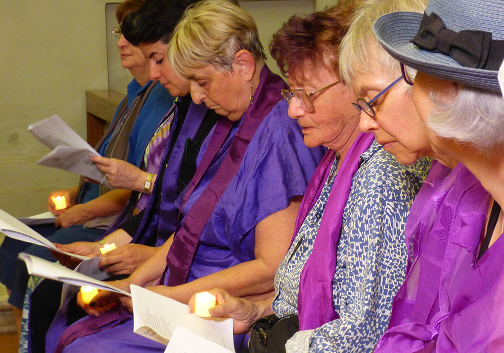 Participants in the Oct. 3 "Let Her Voice Carry" prayer vigil hosted by women's ordination advocates at Rome's Basilica of St. Praxedes. (NCR photo/Rhina Guidos)