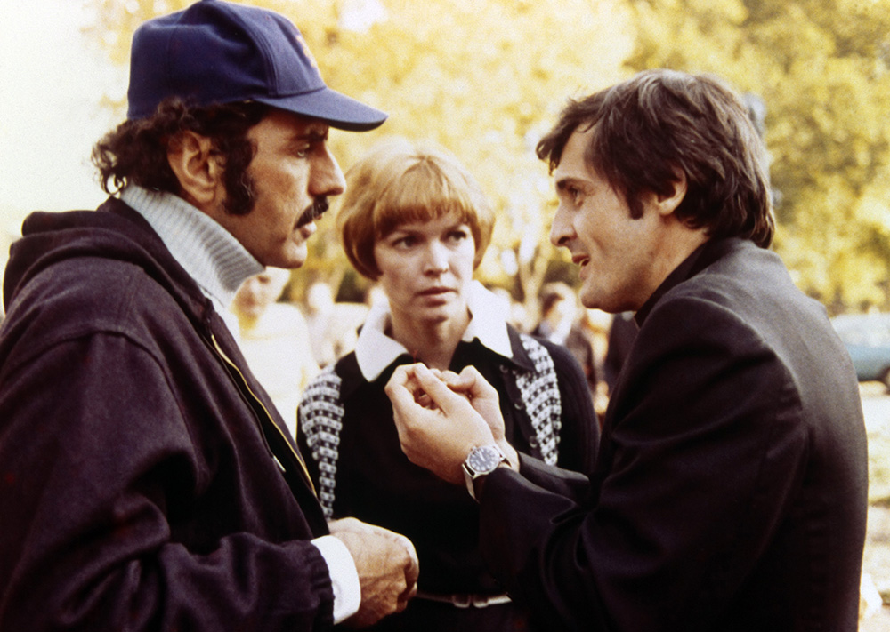 William Peter Blatty, left, speaks with actors Ellen Burstyn and Jason Miller on the set of "The Exorcist" in 1973. (Newscom/Warner Bros./Hoya Productions)