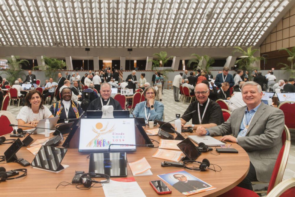 Synod on synodality participants attend a daily session in the Paul VI Hall at the Vatican, Oct. 11. (AP/Maria Langarica Correa)