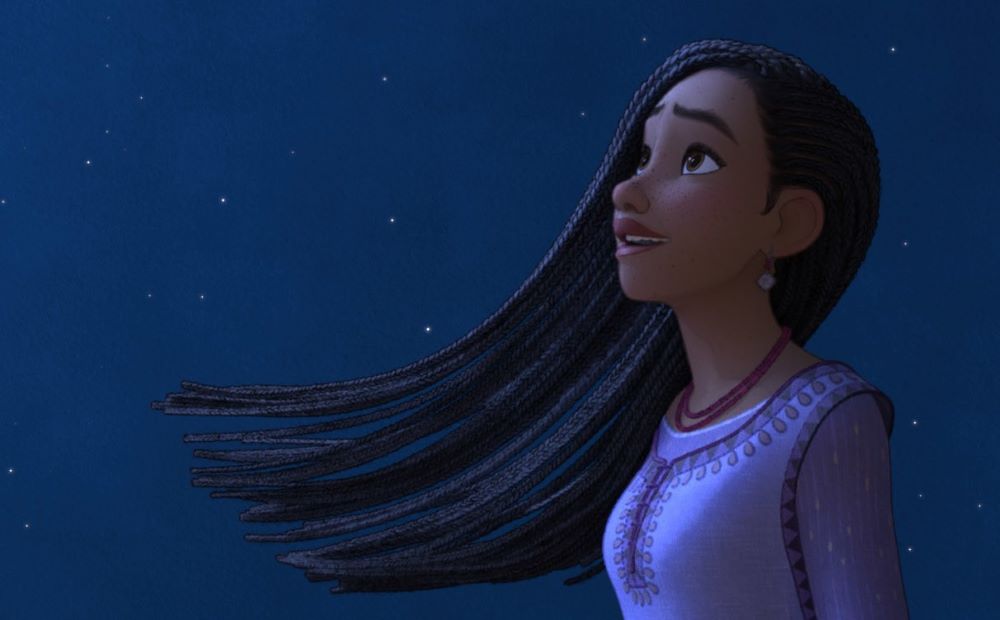 An illustration of a girl with long hair looks at the sky.