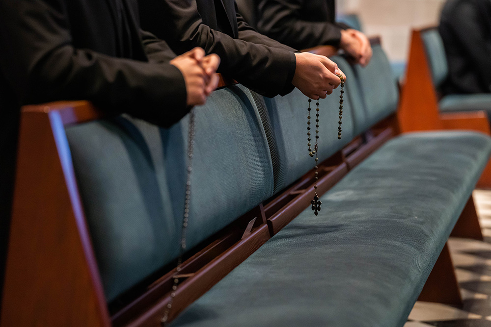 Seminarians pray the rosary during a special Mass on Respect Life Sunday at the Cathedral of the Most Blessed Sacrament in Detroit Oct. 2, 2022. (CNS/Detroit Catholic/Valaurian Waller)