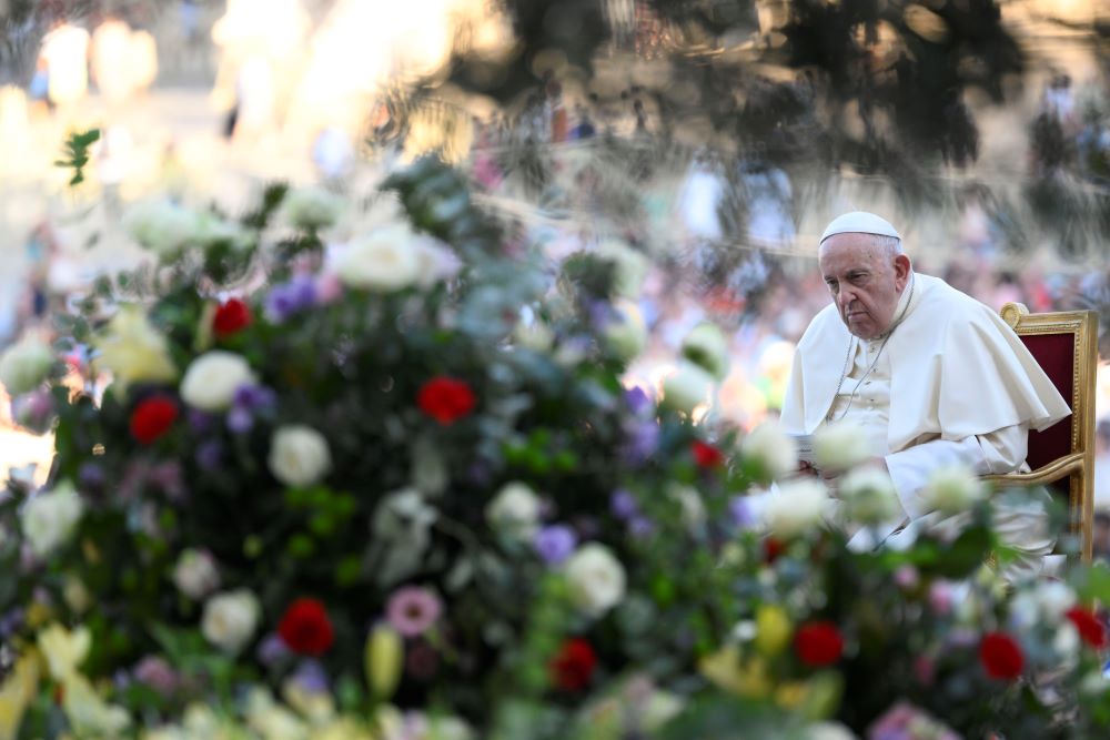 Pope Francis listens during an ecumenical prayer vigil before the assembly of the Synod of Bishops in St. Peter's Square at the Vatican Sept. 30, 2023. (CNS/Vatican Media)