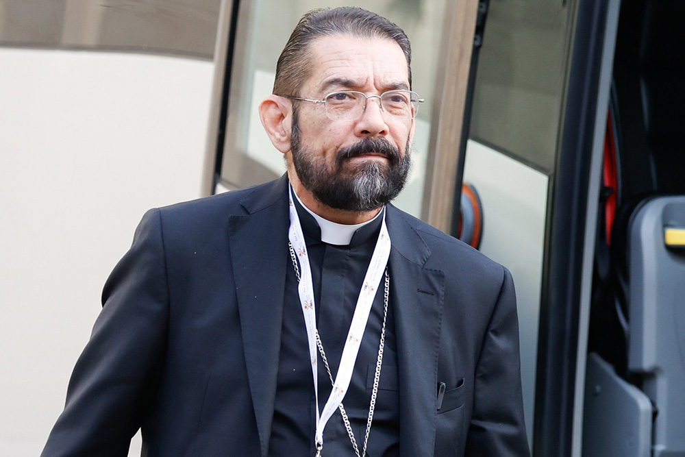 U.S. Bishop Daniel Flores of Brownsville, Texas, arrives for a working session of the assembly of the Synod of Bishops at the Vatican Oct. 16. (CNS/Lola Gomez)