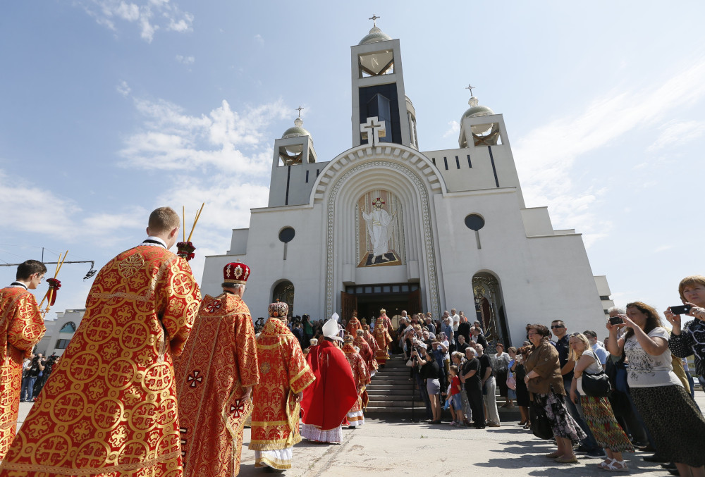 Clergymen into the Patriarchal Cathedral of the Resurrection of Christ in Kiev, Ukraine, June 5, 2017. (OSV News photo/Valentyn Ogirenko, Reuters)