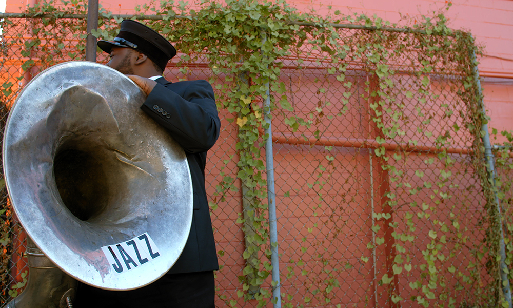 A tuba player prepares to play a jazz funeral in New Orleans in Jason Berry's documentary "City of a Million Dreams." (Courtesy of Spirit Tide Productions)