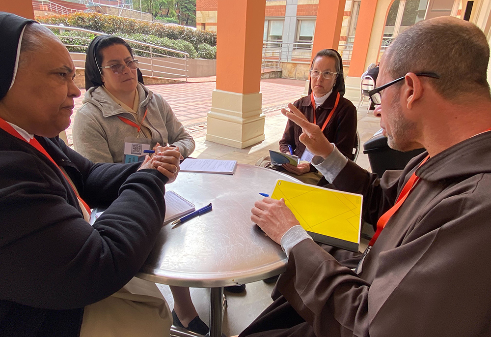 A group of Sisters of Charity of Cardinal Sancha and a Capuchin Franciscan gathered in a small group Nov. 24 on the campus of La Salle University in Bogotá, Colombia, to talk about their experiences in consecrated life, contemplating a change in structures and ways of improving community life. (GSR photo/Rhina Guidos)