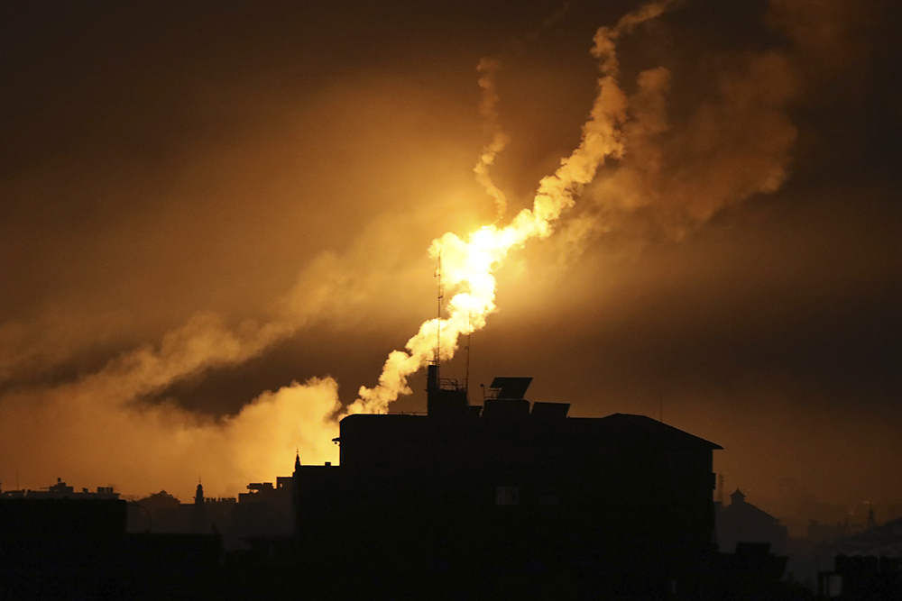 Israeli forces' flares light up the night sky in northern Gaza Strip on Oct. 31. (AP/Abed Khaled)