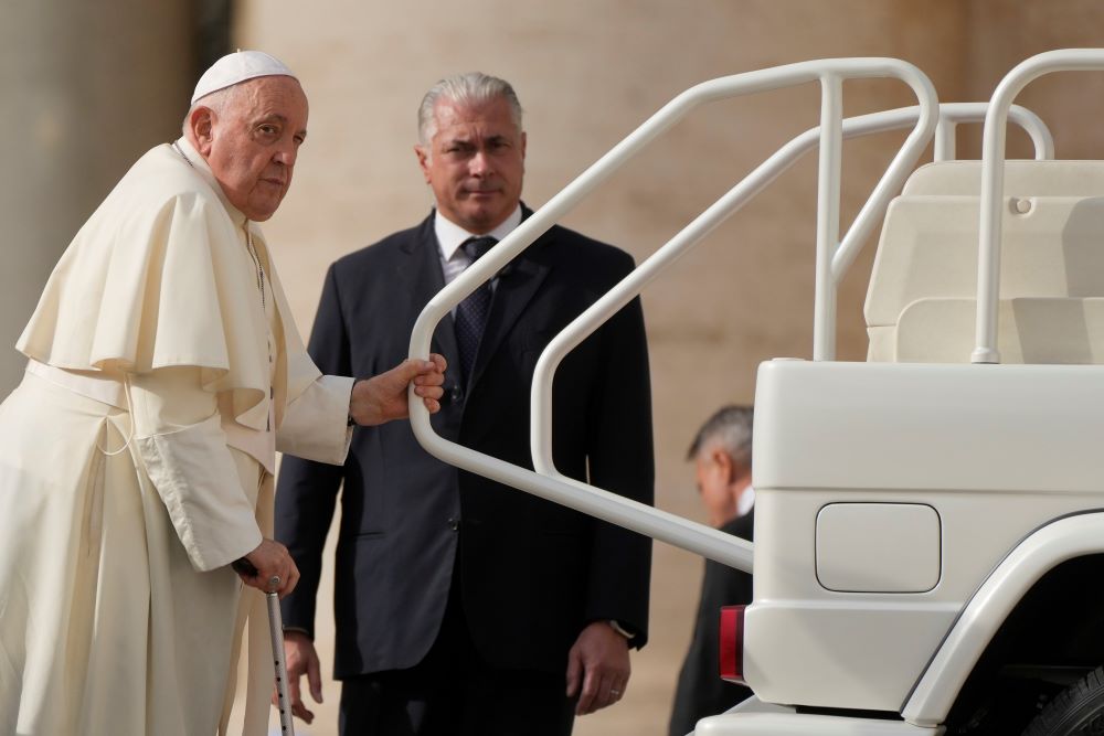 Pope Francis leaves at the end of the weekly general audience in St. Peter's Square, at the Vatican, Wednesday, Nov. 15, 2023. (AP Photo/Gregorio Borgia)