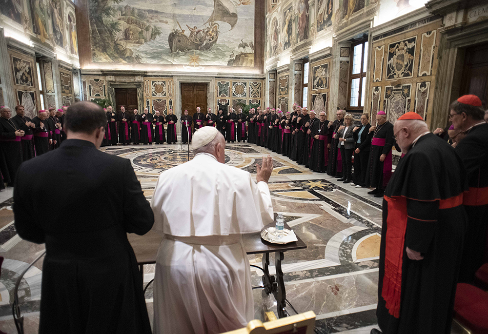 Pope Francis gives his blessing to the bishops of Germany during a meeting in the Clementine Hall of the Apostolic Palace Nov. 17, 2022, as part of the bishops' "ad limina" visits to the Vatican. (CNS/Vatican Media)