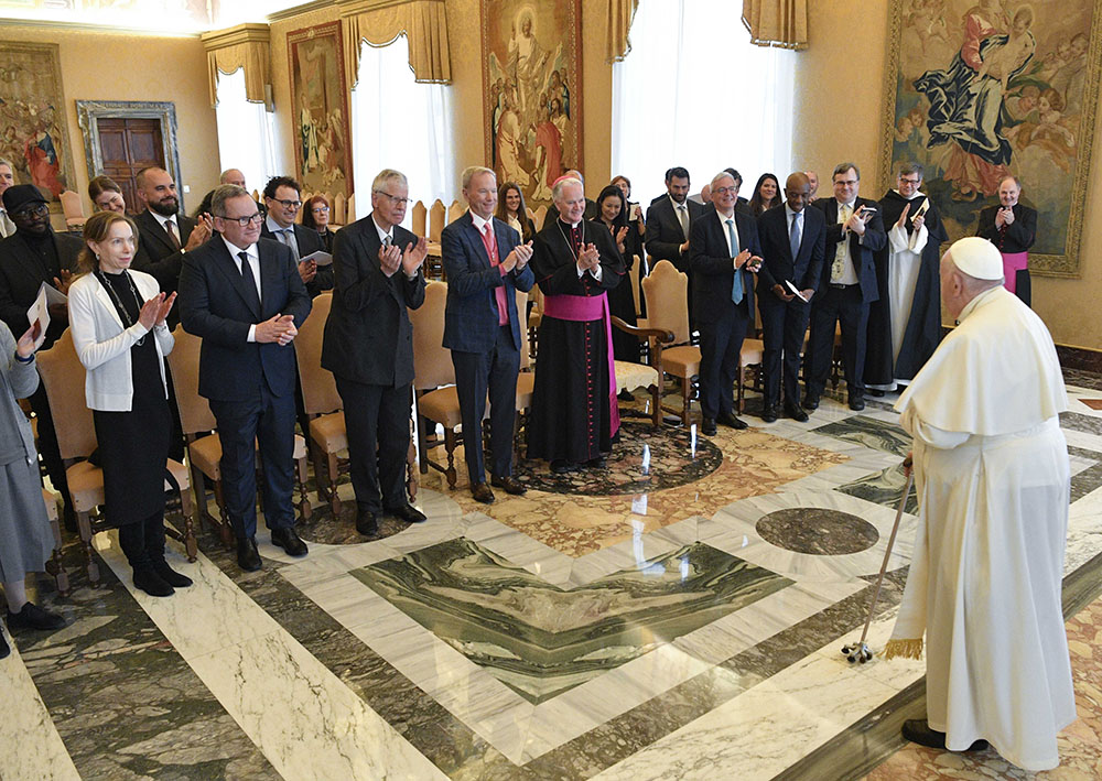 Pope Francis meets leaders from the tech industry at the Vatican March 27. The pope called for an "ethical and responsible" development of artificial intelligence. (CNS/Vatican Media)