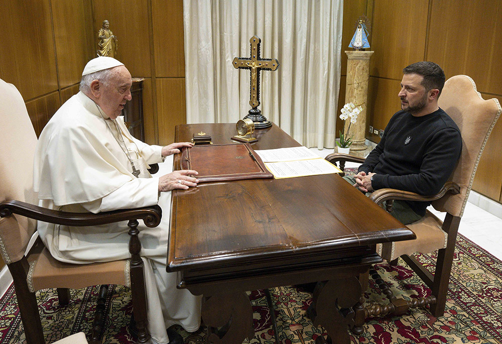 Pope Francis and Ukrainian President Volodymyr Zelenskyy meet May 13 in the pope's studio at the back of the Vatican audience hall. (CNS/Vatican Media)