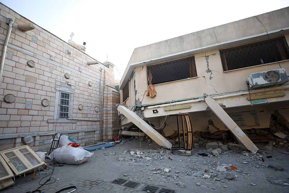 Debris surrounds St. Porphyrios Greek Orthodox Church in Gaza Oct. 20, after an explosion went off the night before. (OSV News/Reuters/Mohammed Al-Masri)