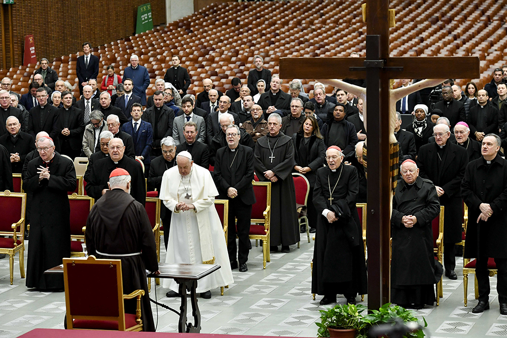 Cardinal Raniero Cantalamessa, preacher of the papal household, presents an Advent meditation for Pope Francis, officials of the Roman Curia and Vatican employees in the Paul VI hall at the Vatican Dec. 15. (CNS/Vatican Media)