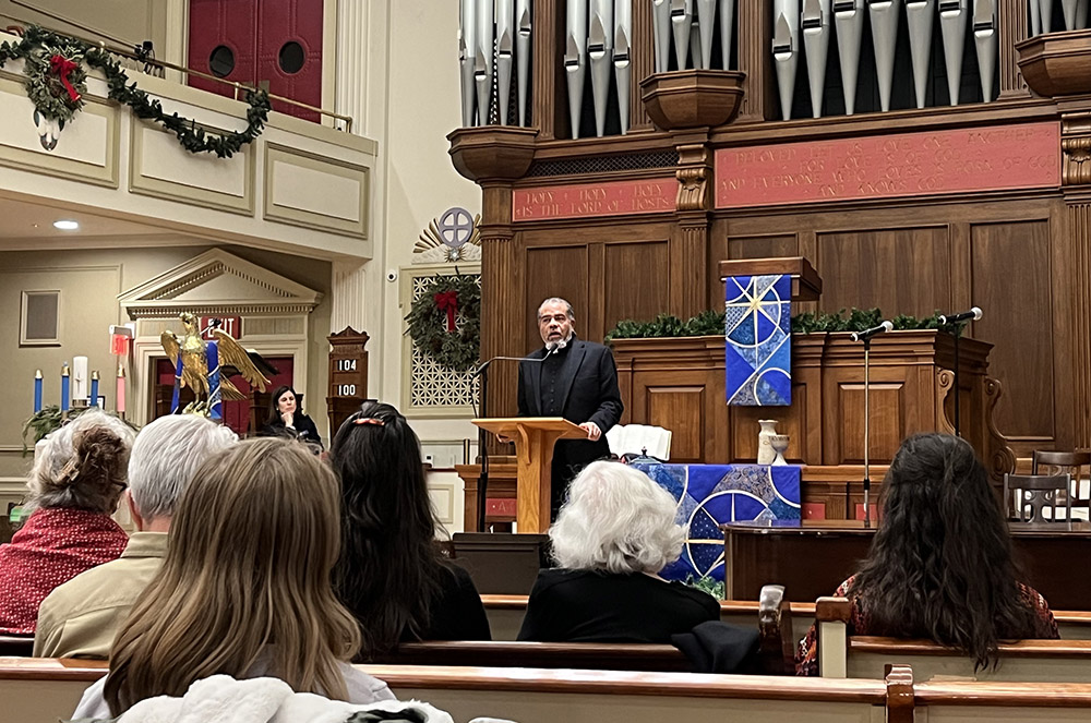 The Rev. Mark Thompson, a podcaster and activist, speaks at a cease-fire service at New York Avenue Presbyterian Church in Washington, D.C., on Dec. 11. (NCR photo/Aleja Hertzler-McCain)