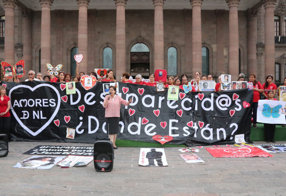 Morales and the group AMORES are pictured Aug. 30, 2015, during the International Day of Victims of Forced Disappearances. Every August mothers of victims, along with Morales, march throughout downtown Monterrey and meet in front of the Nuevo León's Governor's Palace to demand justice for those tortured, disappeared and murdered in northeastern Mexico. (Courtesy of Consuelo Morales)