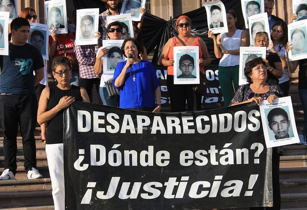 Morales in August 2011 with a group of mothers of victims in front of Nuevo León's Governor's Palace in Monterrey. This was the first year in which the International Day of Victims of Enforced Disappearances was commemorated around the world. (Courtesy of Consuelo Morales)