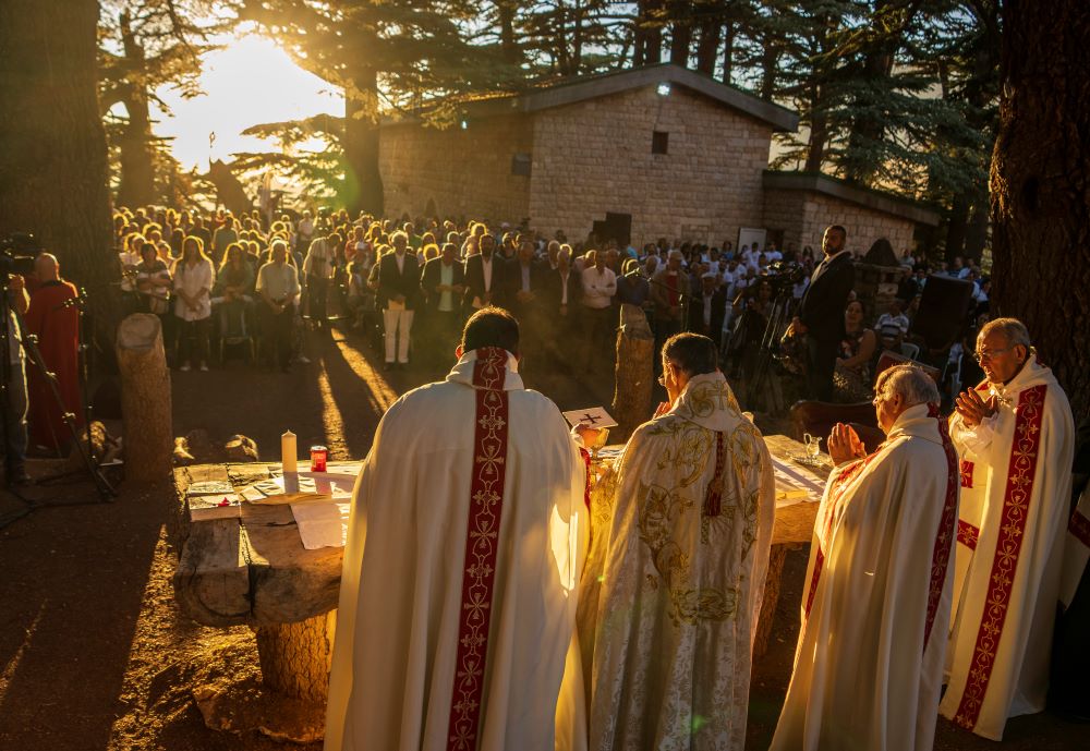 Lebanese Maronite Christian Patriarch Beshara al-Rai, second left, leads the sermon to commemorate the Feast of the Transfiguration in the Cedars of God forest, in the northeast mountain town of Bcharre, Lebanon, Saturday, Aug. 5, 2023. (AP/Hassan Ammar)