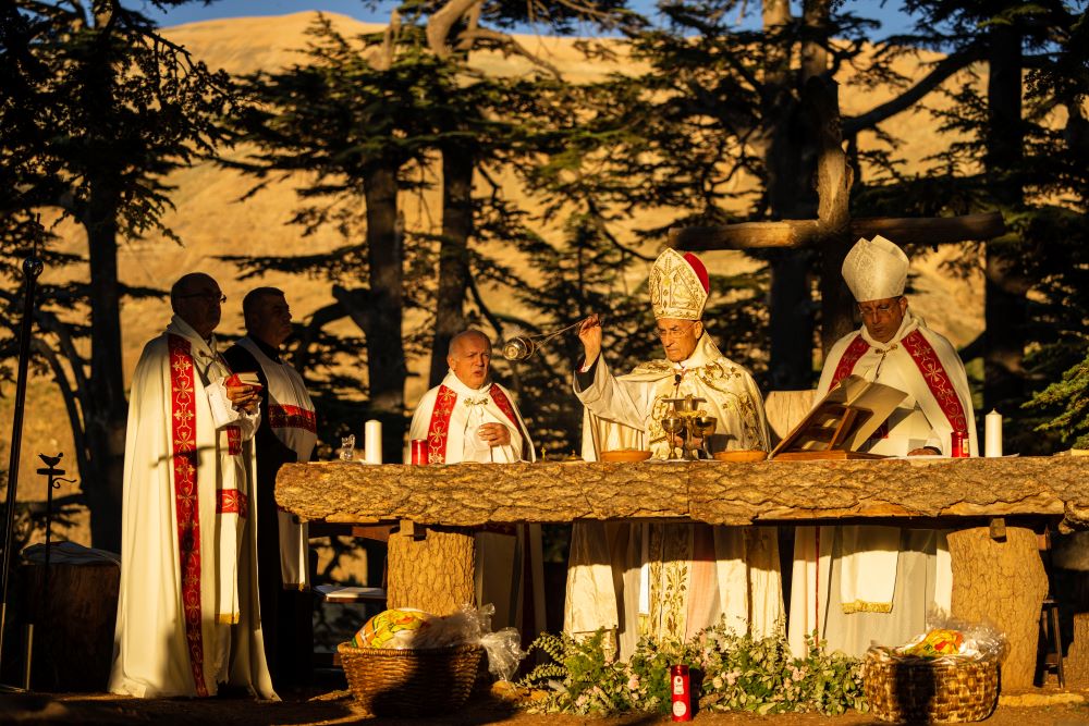 Lebanese Maronite Christian Patriarch Patriarch Beshara al-Rai, second right, leads the sermon to commemorate the Feast of the Transfiguration in the Cedars of God forest, in the northeast mountain town of Bcharre, Lebanon, Saturday, Aug. 5, 2023. (AP/Hassan Ammar)