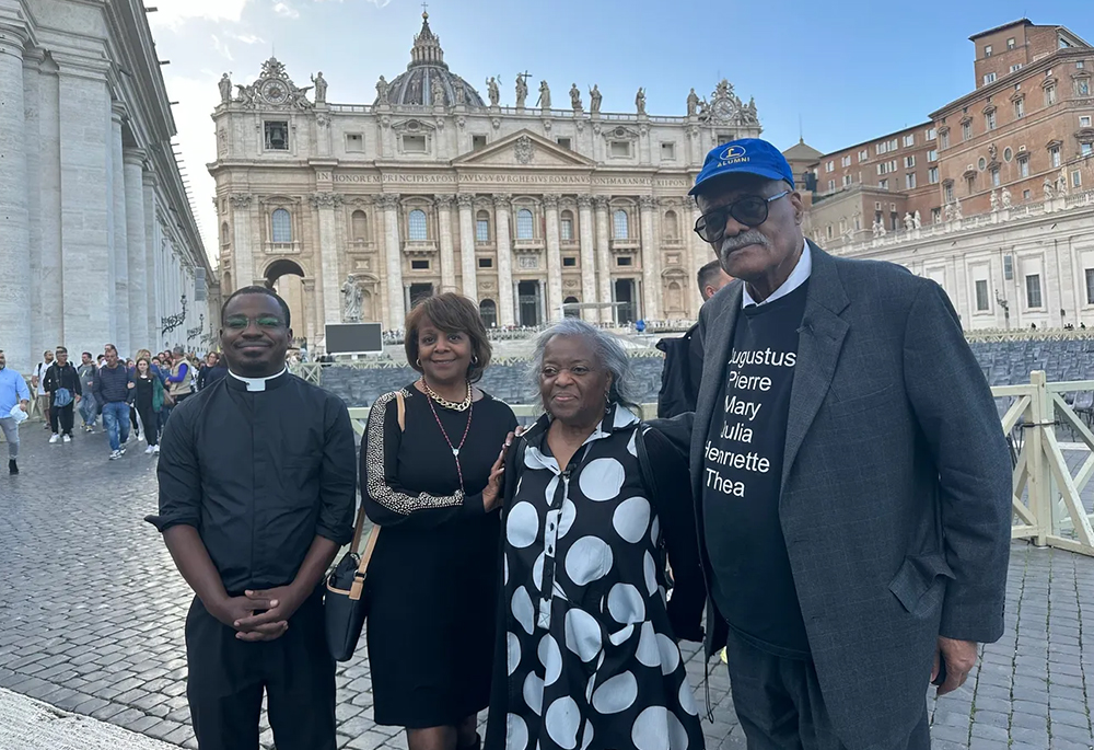 From left: Fr. Willy Kingsley and St. Ann Social Justice Committee members Mary Sewell, Dolores Moore, and Ralph Moore stand in St. Peter's Square during their visit to Rome in October 2023. There they urged Vatican officials to expedite the causes of the first six African American Catholics on the path to sainthood. (Courtesy of Ralph Moore)
