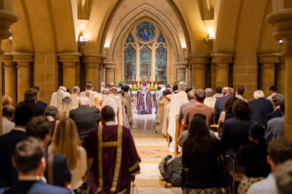 Archbishop Anthony Fisher of Sydney, principal celebrant, prays at a memorial Mass for Cardinal George Pell Jan. 10, a year after Pell died at 81.