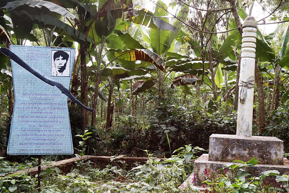 The Garo people have erected a monument to tribal leader Piren Snal, who was killed during a peaceful protest for land rights and forest conservation on Jan. 3, 2004, in the Madhupur area of Tangail in central Bangladesh. He is considered as a martyr in his village, and villagers pay homage every year on his death anniversary. (Stephan Uttom Rozario)
