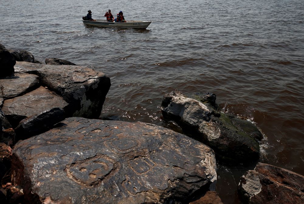 Rock paintings are seen at the Ponta das Lajes archaeological site, in the rural area of Manaus, Brazil, on Oct. 28. The archaeological site was exposed following a drought in the Negro River, unveiling rock paintings that, according to archaeologists, date back between 1,000 and 2,000 years. (AP/Edmar Barros)