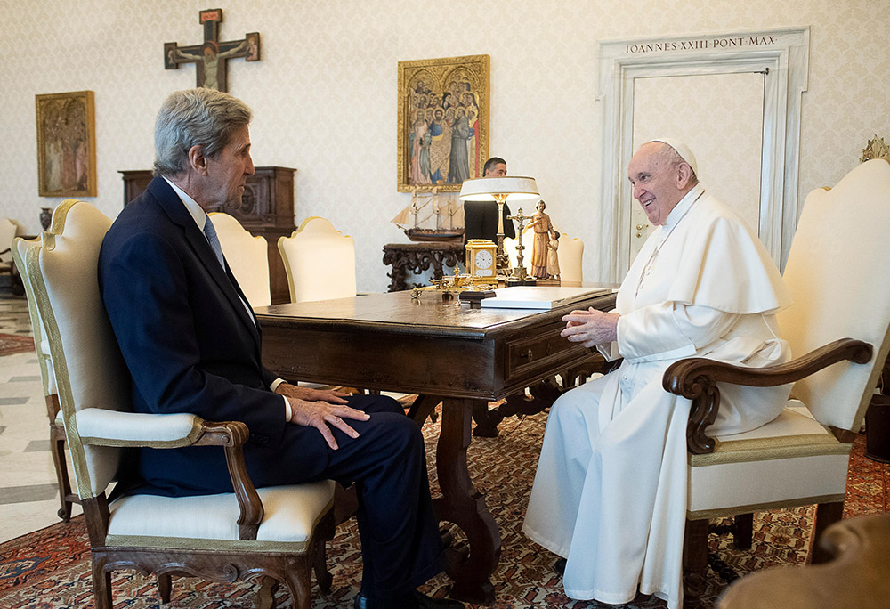 Pope Francis meets John Kerry, U.S. special presidential envoy for climate, at the Vatican May 15, 2021. (CNS/Vatican Media)