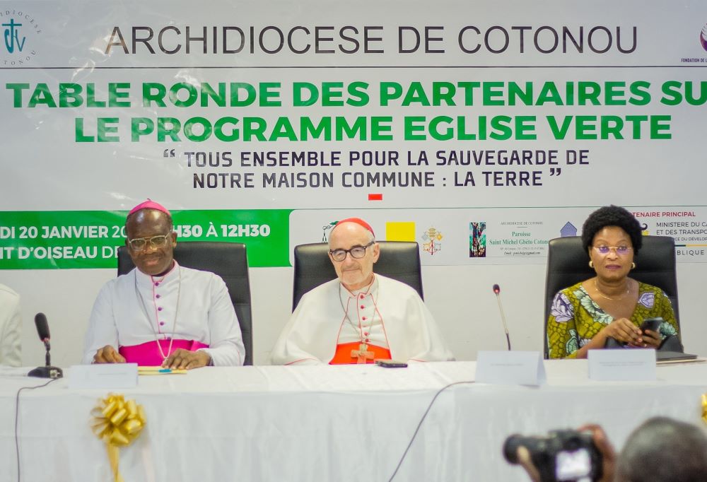 Cardinal Michael Czerny, prefect of the Dicastery for Promoting Integral Human Development, center, speaks Jan. 20, 2024, in Cotonou, Benin, during a roundtable on the the Archdioceses of Cotonou's Green Church Program. At left is Archbishop Roger Houngbédji of Cotonou. (OSV News photo/courtesy Dicastery for Promoting Integral Human Development)