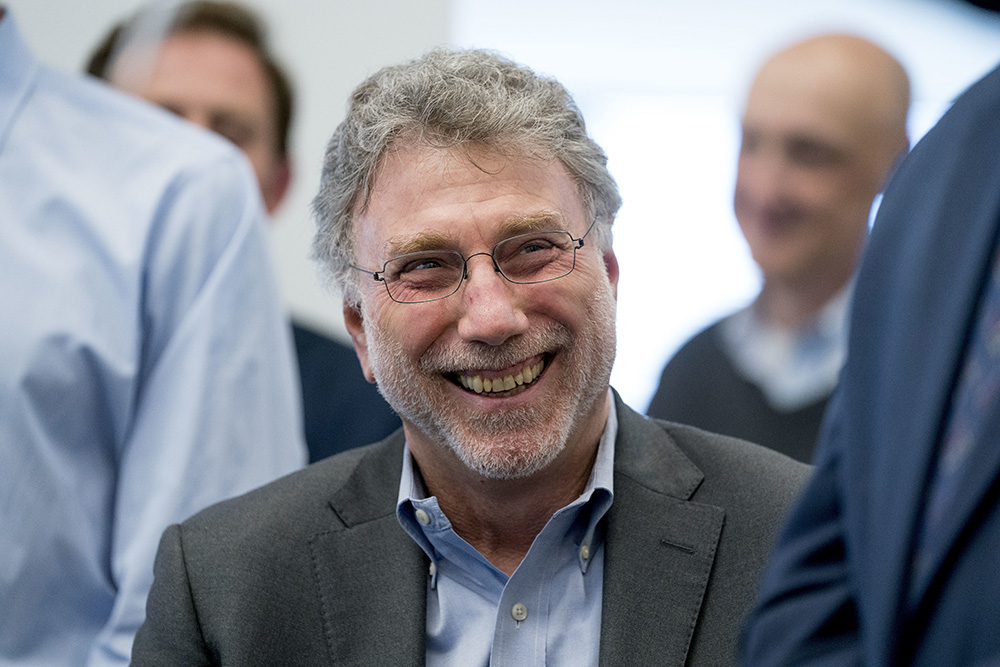 Martin Baron, then executive editor of The Washington Post, smiles during a newsroom celebration April 16, 2018, after the newspaper won two Pulitzer Prizes. (AP/Andrew Harnik, File)