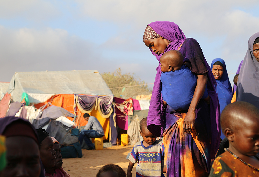 Families affected by drought in Somalia are pictured in this 2017 photo. Parts of Somalia are expected to face famine by July. (Courtesy of Catholic Relief Services/Mohamed Sheikh Nor)